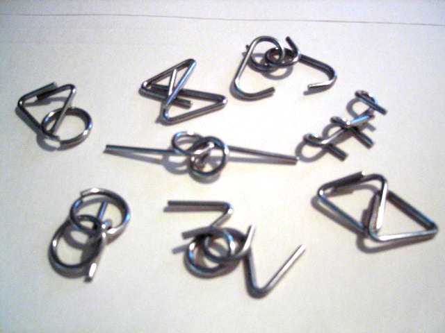 Metal puzzles. You could fiddle around with them for ages, and then